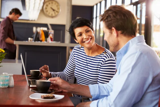 A man and a woman talking to each other